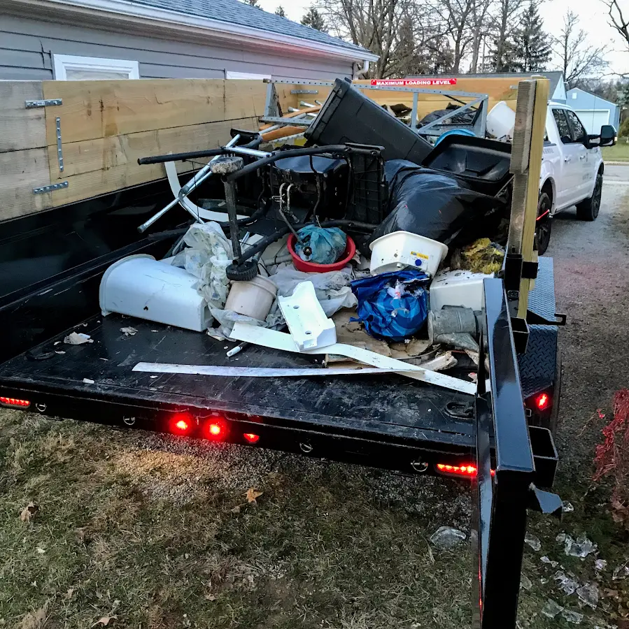 Roll-off dumpster delivered to a residential driveway in Tulsa